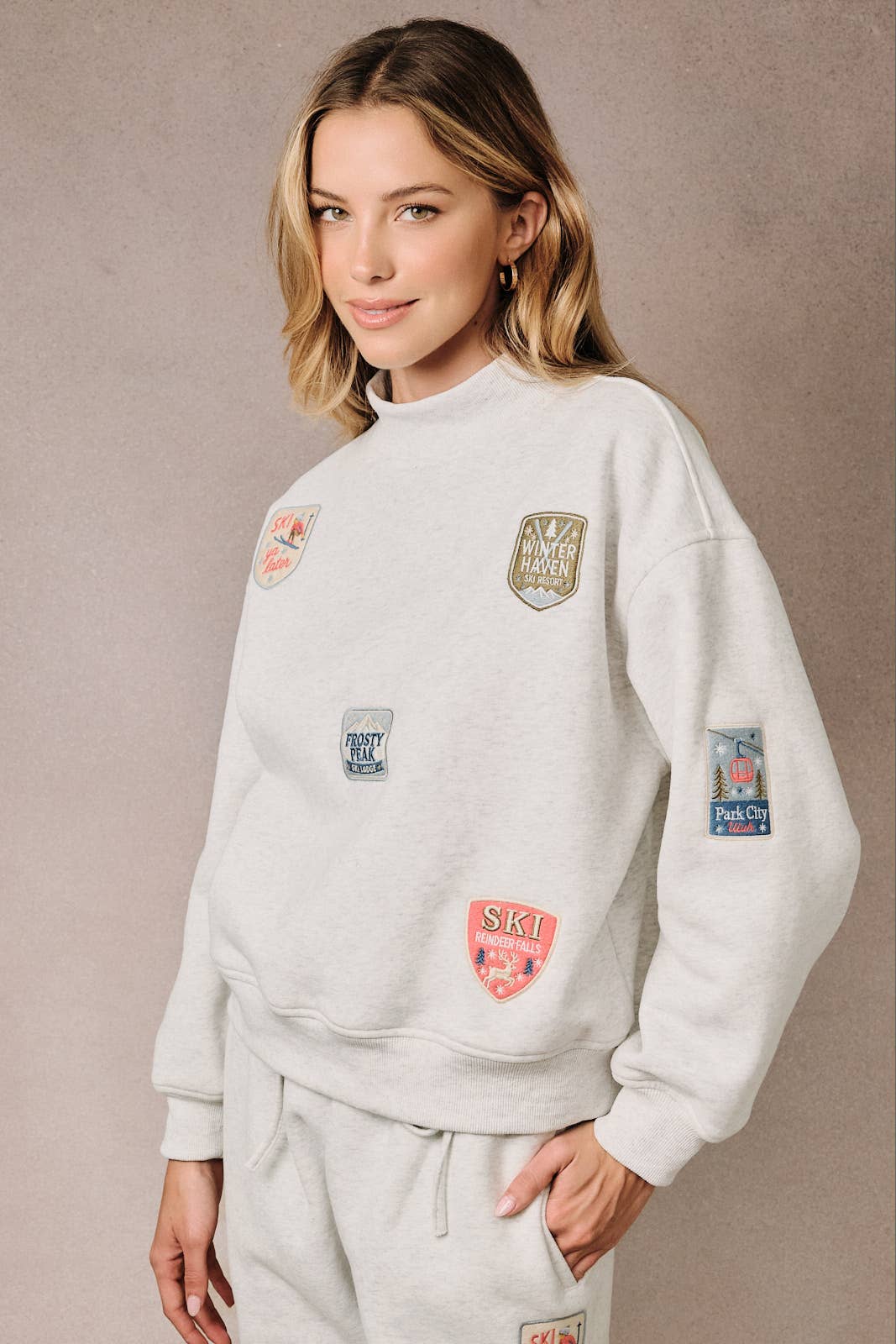 Sunday Edition by LE LIS - HIGH NECK LONG SLEEVE "SKI PATCHES" SWEATSHIRT