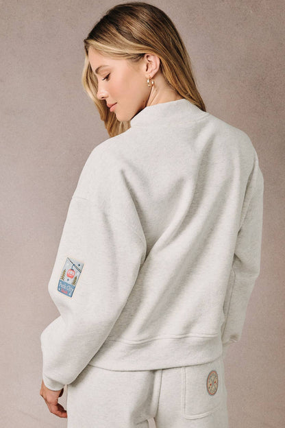 Sunday Edition by LE LIS - HIGH NECK LONG SLEEVE "SKI PATCHES" SWEATSHIRT
